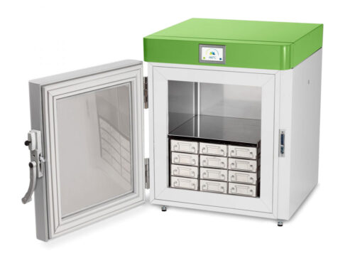Stirling Ultracold Undercounter ULT Freezer with green top and white body. door is open showing draw shelf unit and stainless interior